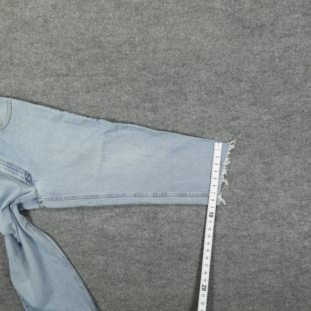 Vintage Levis 560 Jeans Mens 36x26 Light Wash Blue Relaxed Tapered Raw Hem